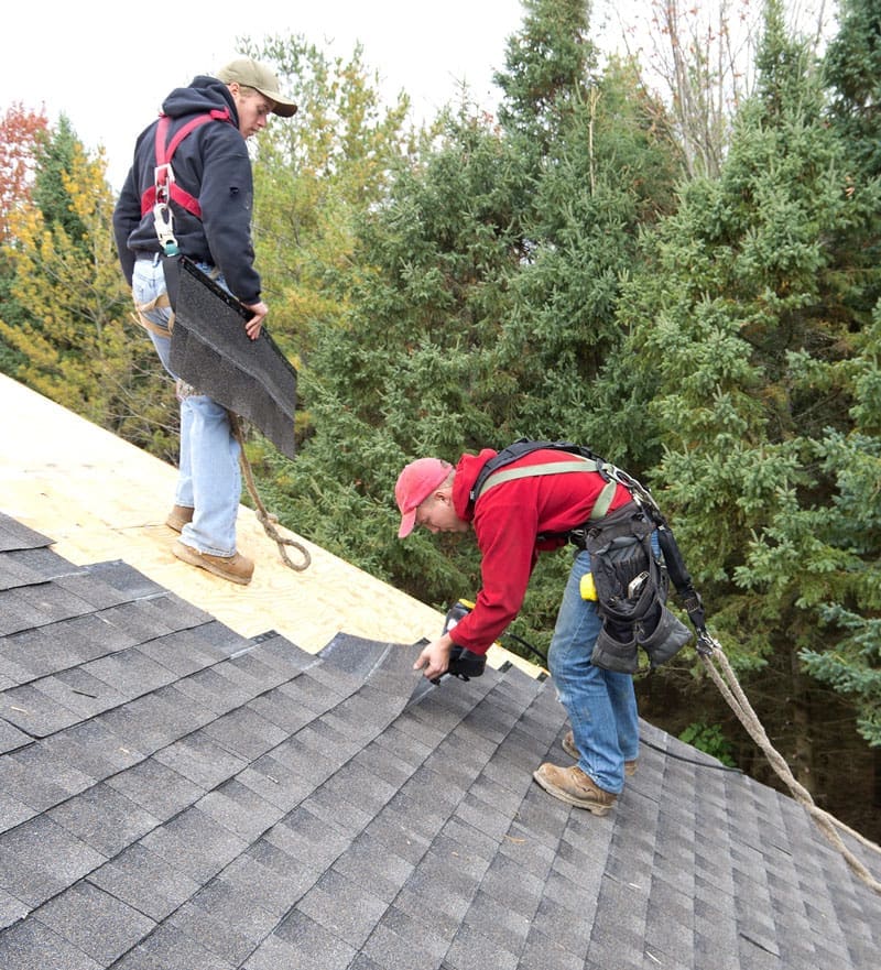 2 Harnessed Roofing working