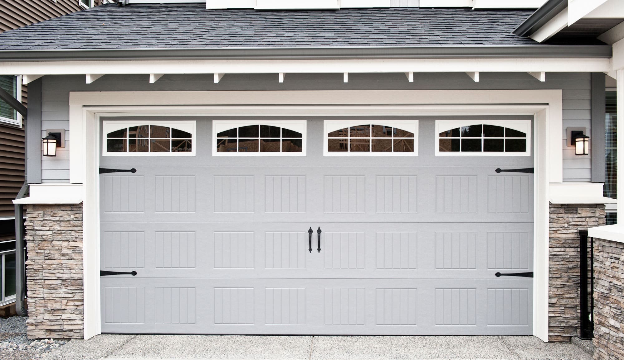 Case-study-Garage-doors close up image of a home with new siding