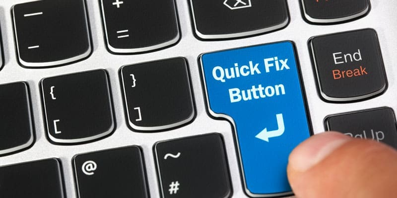 Quick-Fix a keyboard with a finger hanging over a button that says quick fix